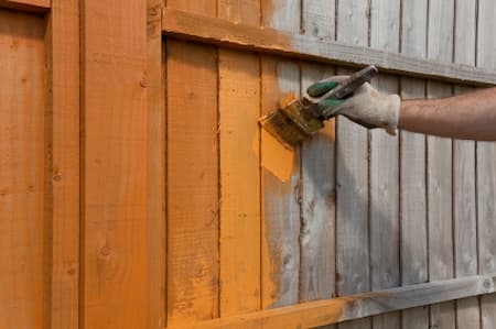 Painting vs. Staining Your Fence: Which One Is Better? Thumbnail